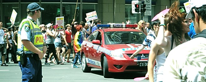 Protesters march in George St (Sydney's main street).